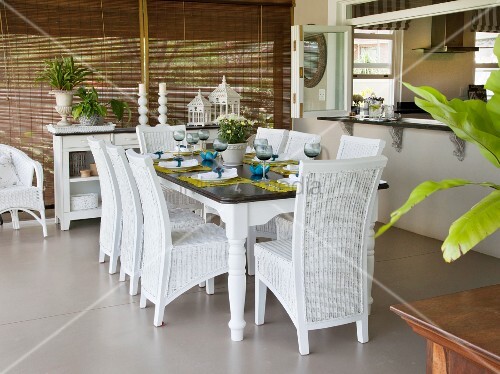 White Wicker Chairs Around Set Table In Buy Image 11290490