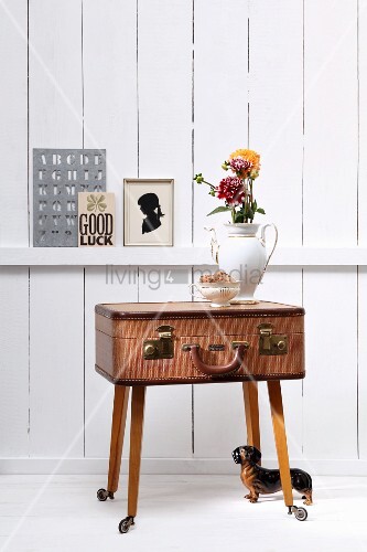 Jug of flowers on top of DIY table made \u2026 \u2013 Buy image