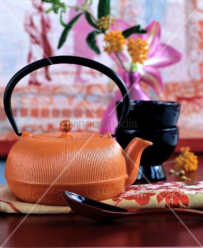 Orange Cast Iron Teapot Arranged With Buy Image 11513742