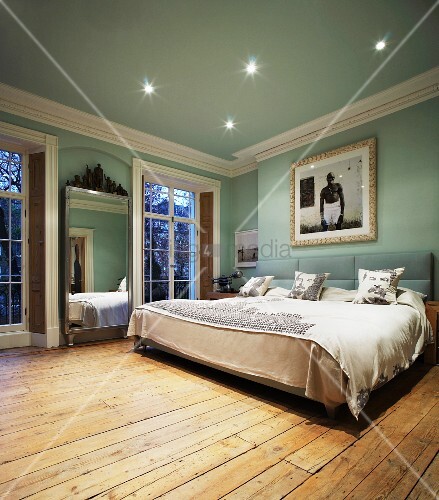 Modern Double Bed And Rustic Floorboards Buy Image