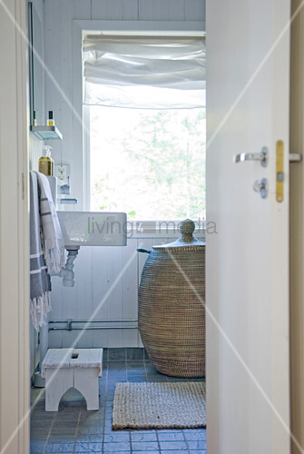 View Through Open Door Of Rattan Laundry Image View Through Open Door Of Rattan Laundry Image