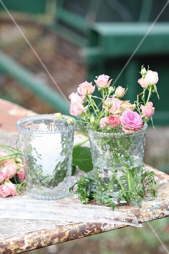 Romantic Arrangement Of Roses And Lit Buy Image 12242838