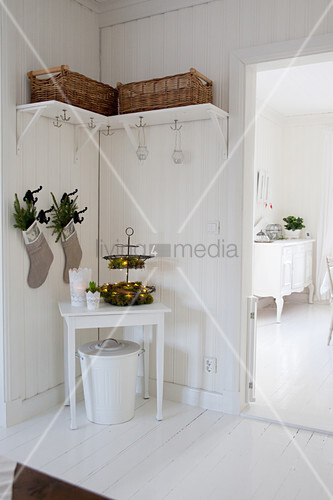 Baskets On Shelves With Hooks Below Buy Image 12343866