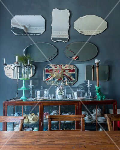 Collection Of Old Mirrors Above Crockery Buy Image 12502852