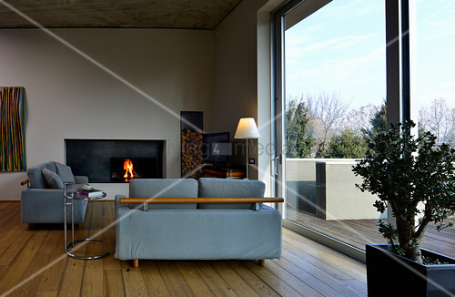 Couch And Fireplace In Seating Area With Buy Image