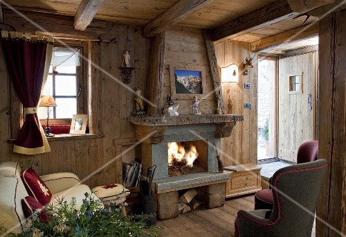 A Cosy Living Room With A Fireplace In A Buy Image 00700432